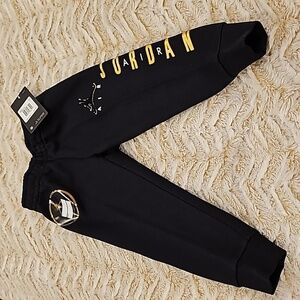 NWT Black and Gold Jordan sweatpants